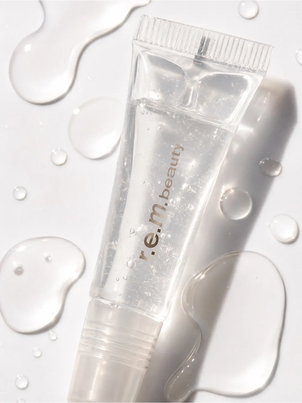 R.E.M. Beauty utmost importance plumping lip gloss.✨NIB